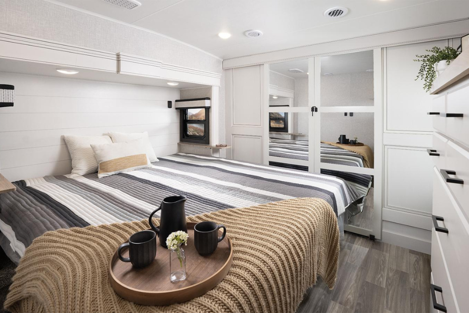 With amenities like walk-in closets, residential appliances, and spaces for the whole family, full-time RVing is a breeze in a fifth wheel