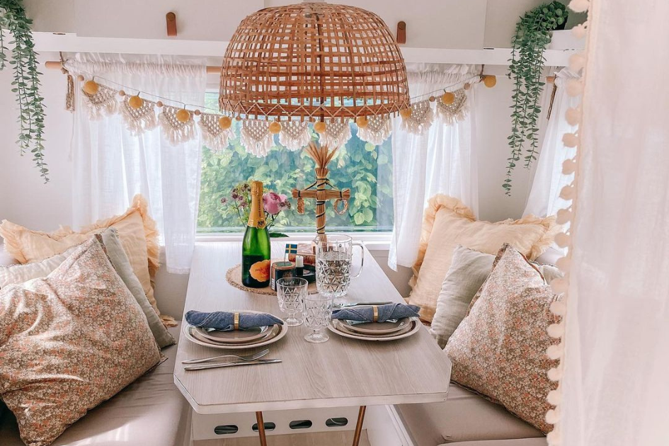 A cozy looking RV kitchen decorated with different textures in natural hues